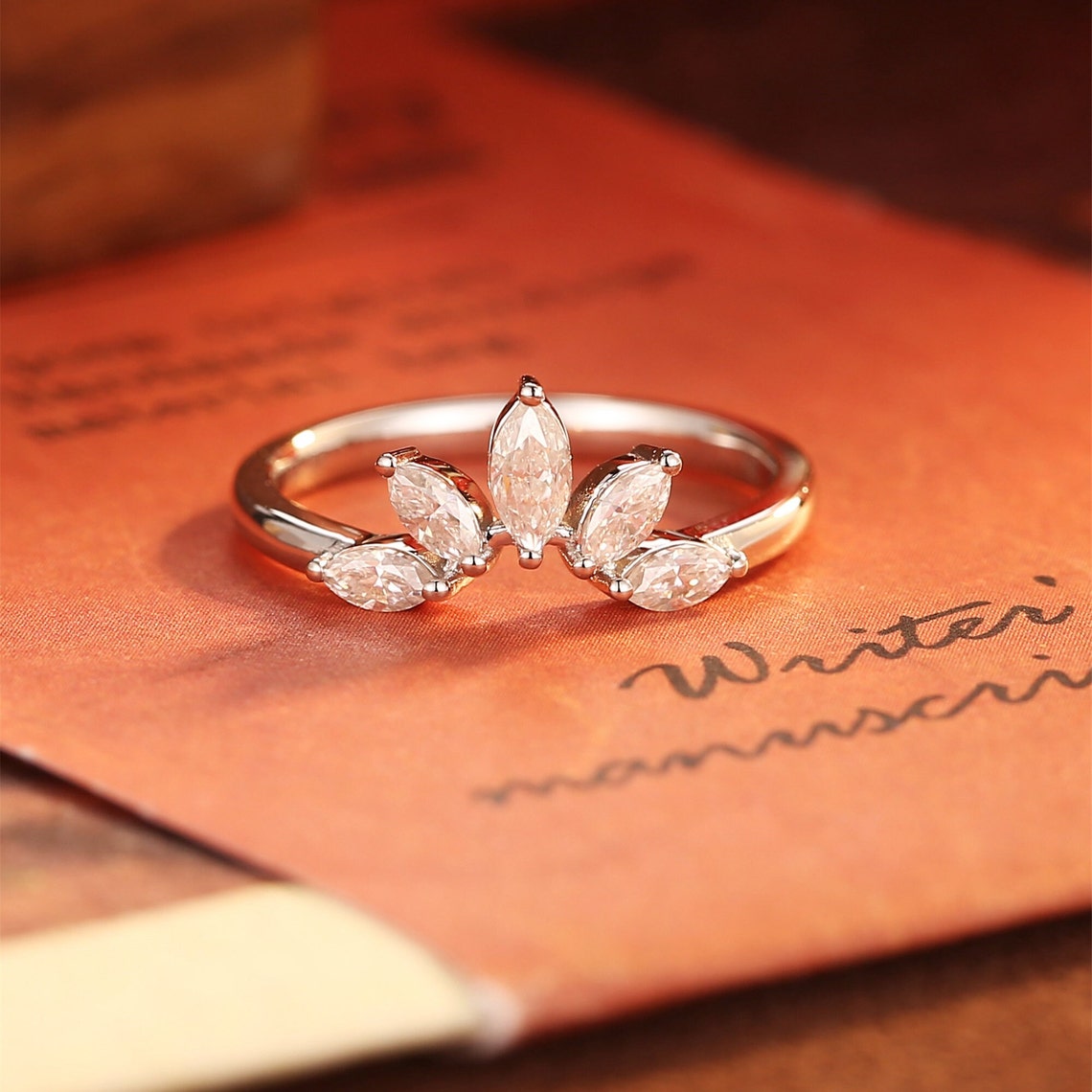 0.15 TCW Marquise Cut Moissanite Bridal Wedding Band With Curved Shank 1