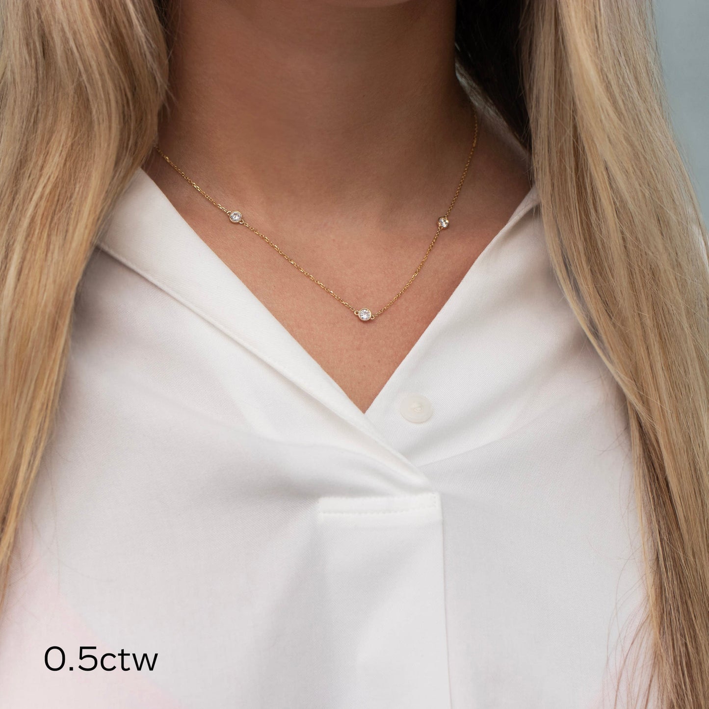 
                  
                    0.5 TCW Floating Round Cut Moissanite Necklace With Triple Bezel Style
                  
                