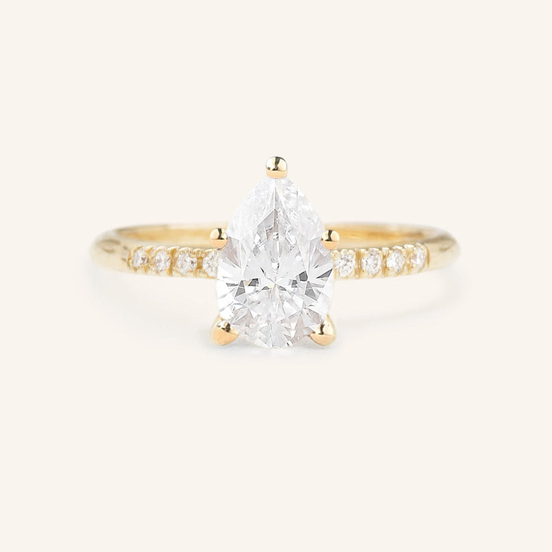 Stunning 1 CT Pear Moissanite Engagement Ring With Pave Design 1