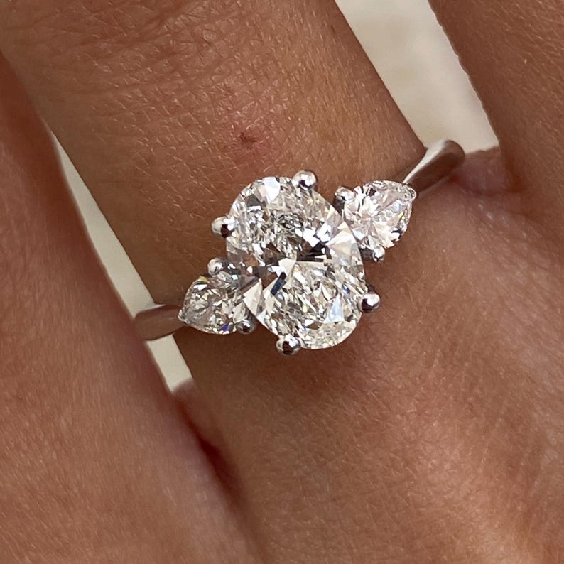 Stunning 1.0 CT Oval Moissanite Engagement Ring with Three Stone Design 4