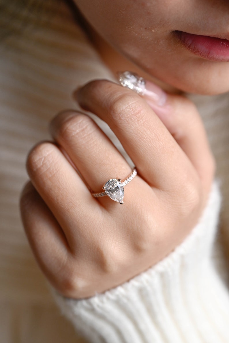 Stunning 1.0 - 2.0 CT Pear Moissanite Engagement Ring with Pave Design 6