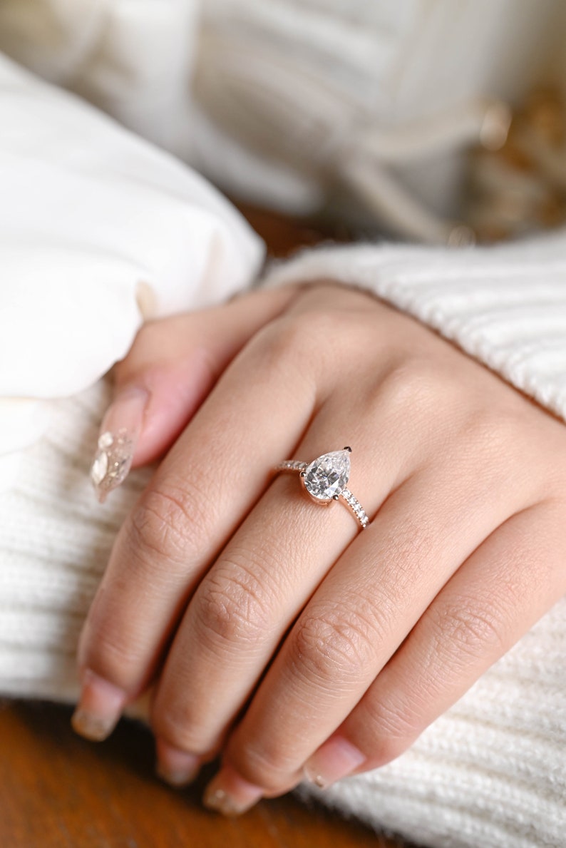 Stunning 1.0 - 2.0 CT Pear Moissanite Engagement Ring with Pave Design 4