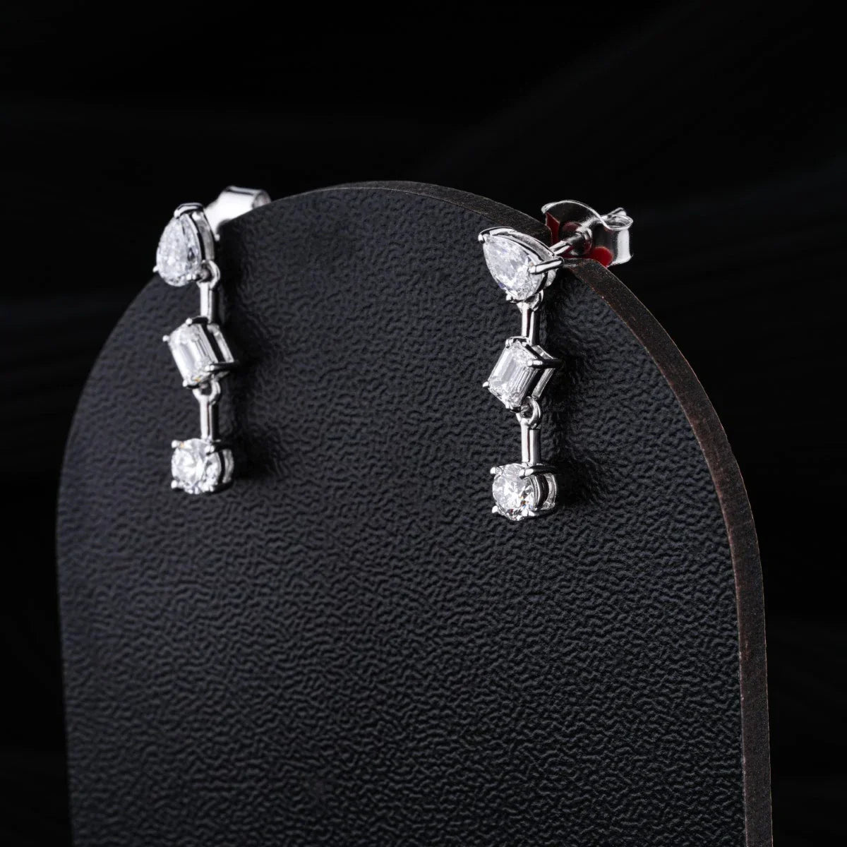 0.83 TCW Round, Pear & Emerald Cut Moissanite Earrings in Gold 3