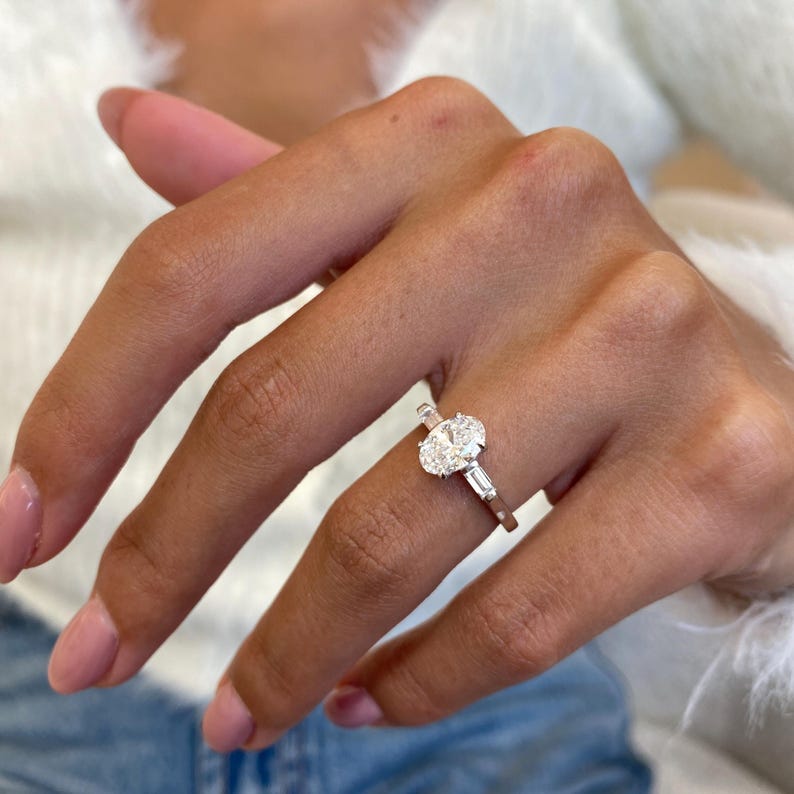 Stunning 1.0 CT Oval Moissanite Engagement Ring in Three stones Design 1