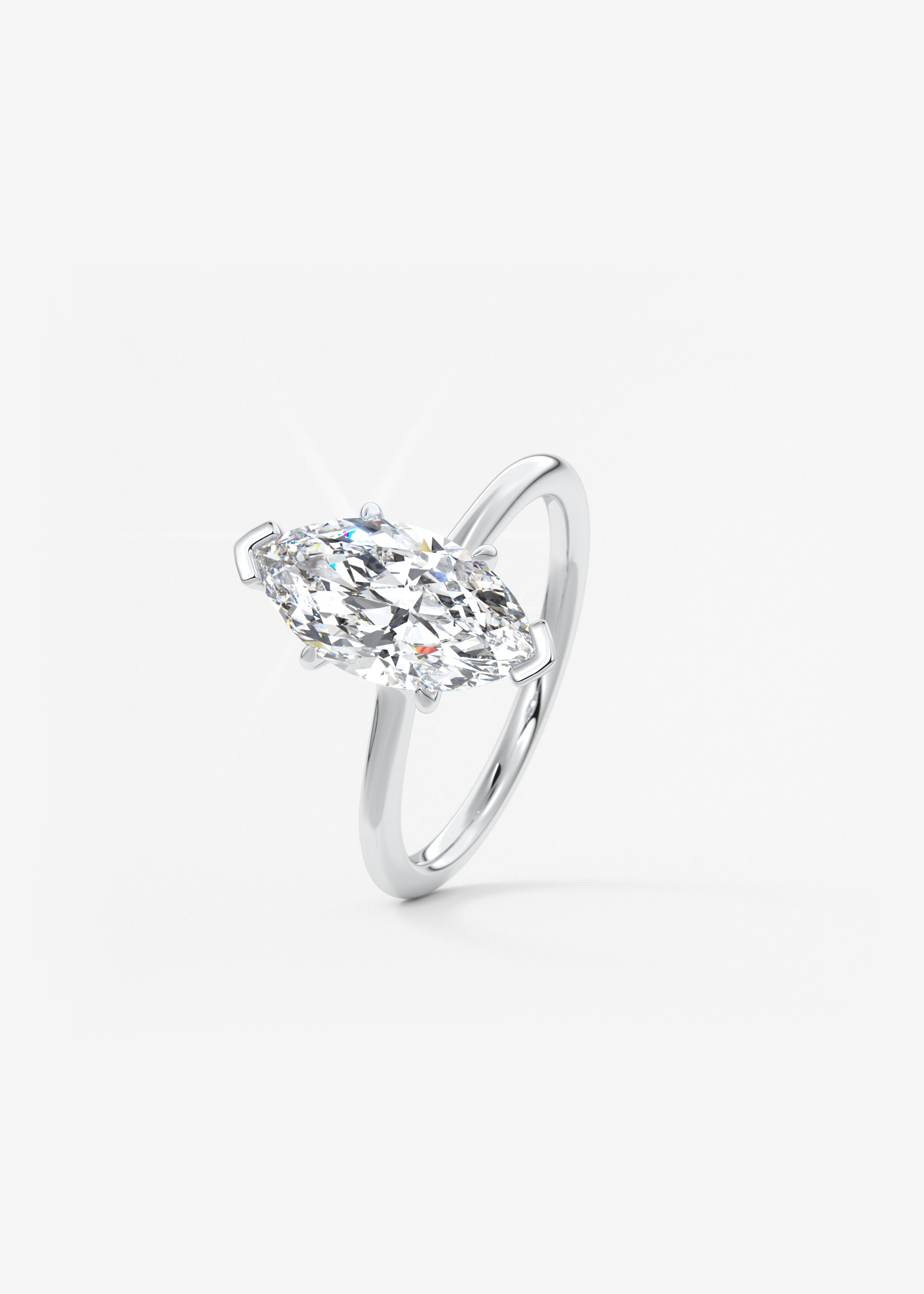 Marquise Three Stone Bezel Lab Grown Diamond Engagement Ring