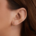0.50 TCW Round Cut Moissanite Huggies Earrings in Gold 2