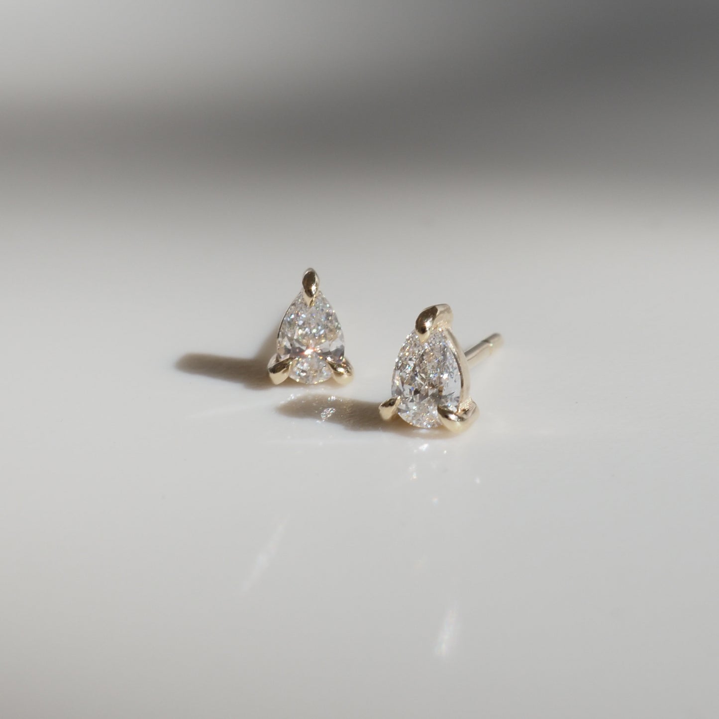 2.0 TCW Pear Cut Moissanite Stud Earrings in Gold 1