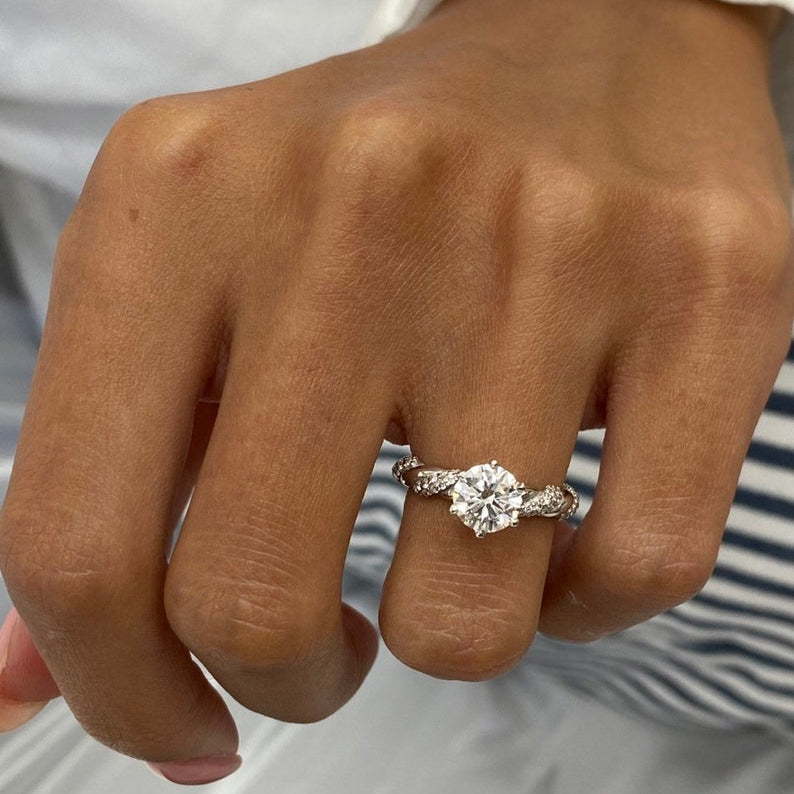 Classic 1.0 CT Round Moissanite Engagement Ring with Twist Pave Design 1