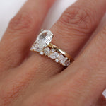 Stunning 0.4 TCW Pear and Round Moissanite Stones in Half Eternity Wedding Band 4