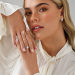 Stunning 1.65 TCW Oval & Pear Moissanite Engagement Ring with Three Stone Design 6