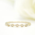 Stunning 0.2 TCW Round Moissanite Stones 5 Stones Wedding Bands 2