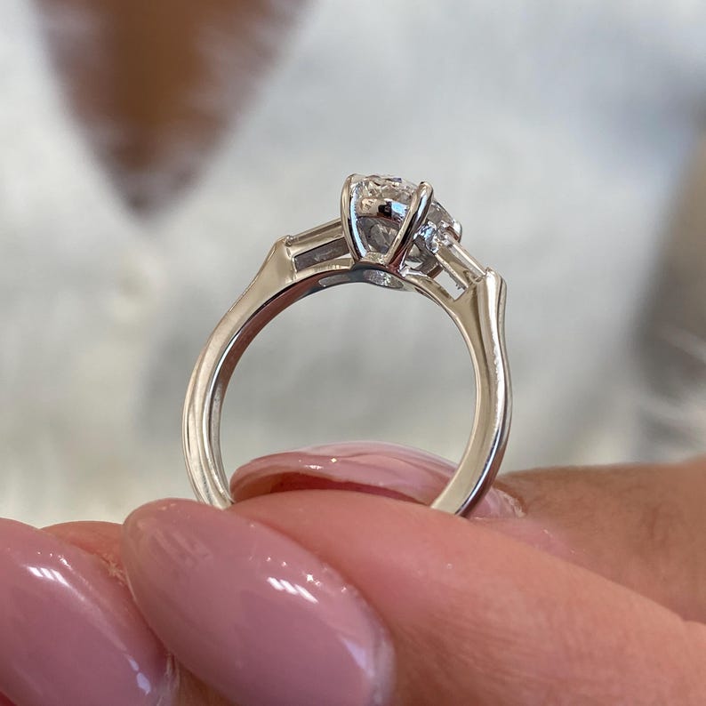 Stunning 1.0 CT Oval Moissanite Engagement Ring in Three stones Design 9