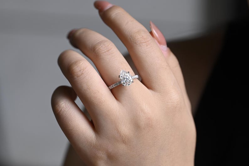 Stunning 1.0 - 2.0 CT Pear Moissanite Engagement Ring with Pave Design 6