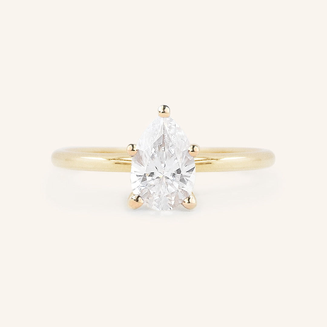 Stunning 1 CT Pear Moissanite Engagement Ring With Solitaire Design 1