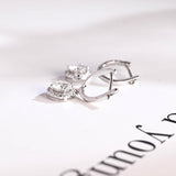 1.30 TCW Round Cut Moissanite Drop Earrings in Gold 9