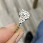 Stunning 1.0 CT Round Moissanite Engagement Ring with 3 Stones Design 4