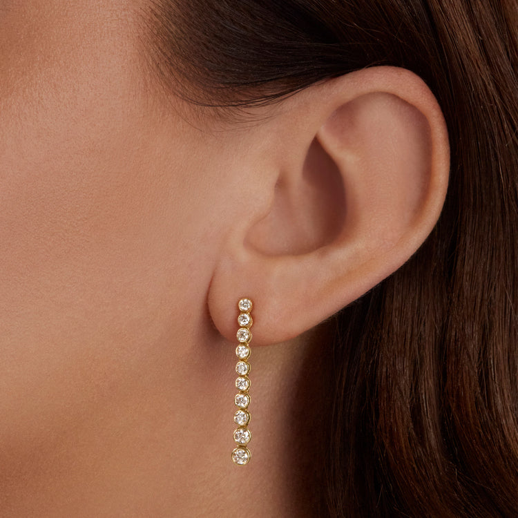 1.0 TCW Round Cut Moissanite Bezel Dangle Earrings in Gold 3