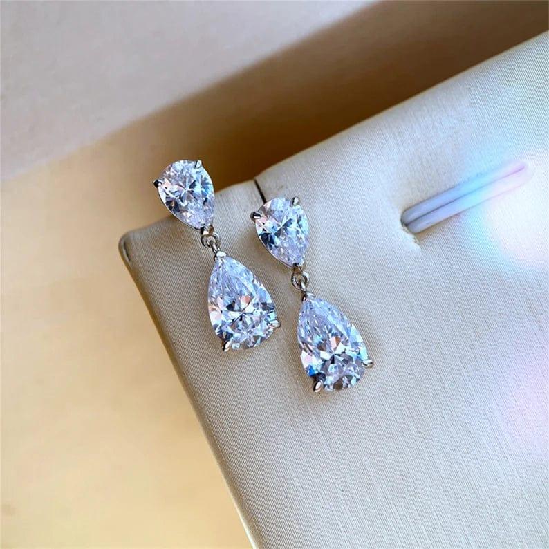 
                  
                    3 TCW Pear Cut Hoops Moissanite Earrings
                  
                