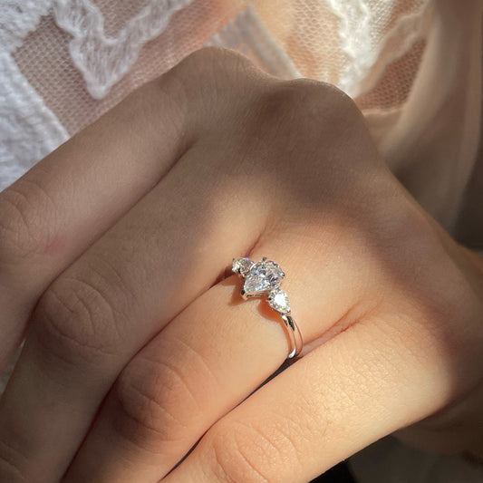 Stunning 2.0 CT Pear Moissanite Engagement Ring with Three Stone Design 1