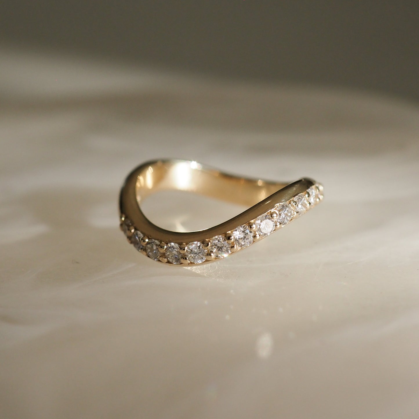 Stunning 0.4 TCW Round Moissanite Stones Curved Wedding Band 1