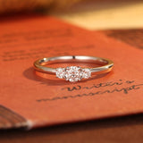 Stunning 1.0 CT Round Cut Moissanite Engagement Ring with Three Stone Design 1