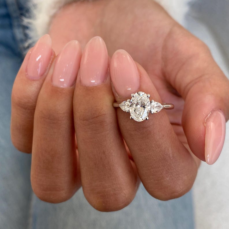 Stunning 1.0 CT Oval Moissanite Engagement Ring with Three Stone Design 3