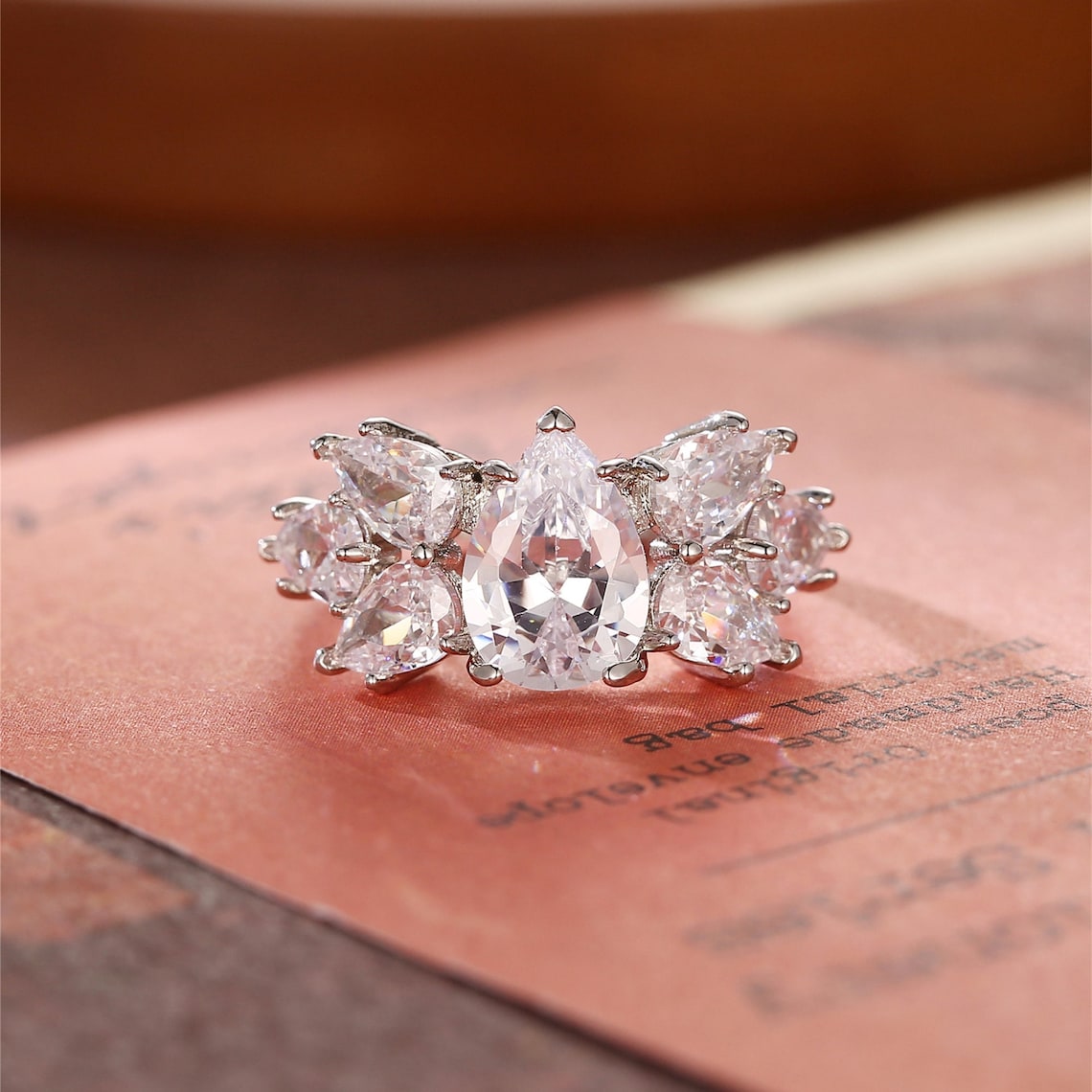 Stunning 2.0 CT Pear Moissanite Engagement Ring with Cluster Design 1