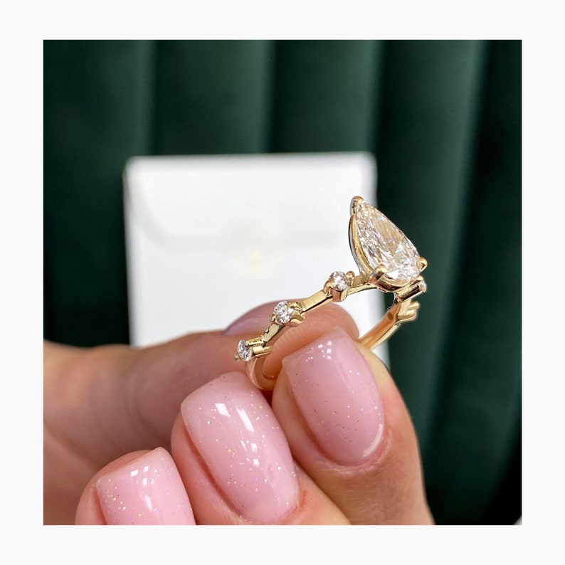 Stunning 1.0 CT Pear Moissanite Engagement Ring with Dainty Pave Design 3