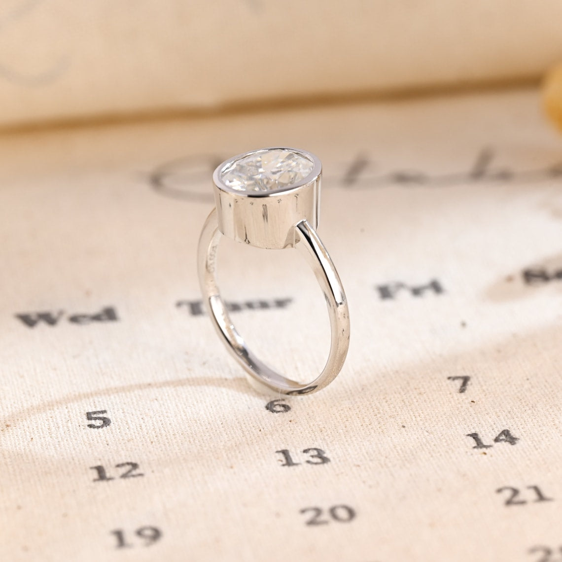 Stunning 1.0 CT Oval Cut Moissanite Engagement Ring with Solitaire Bezel Design 3