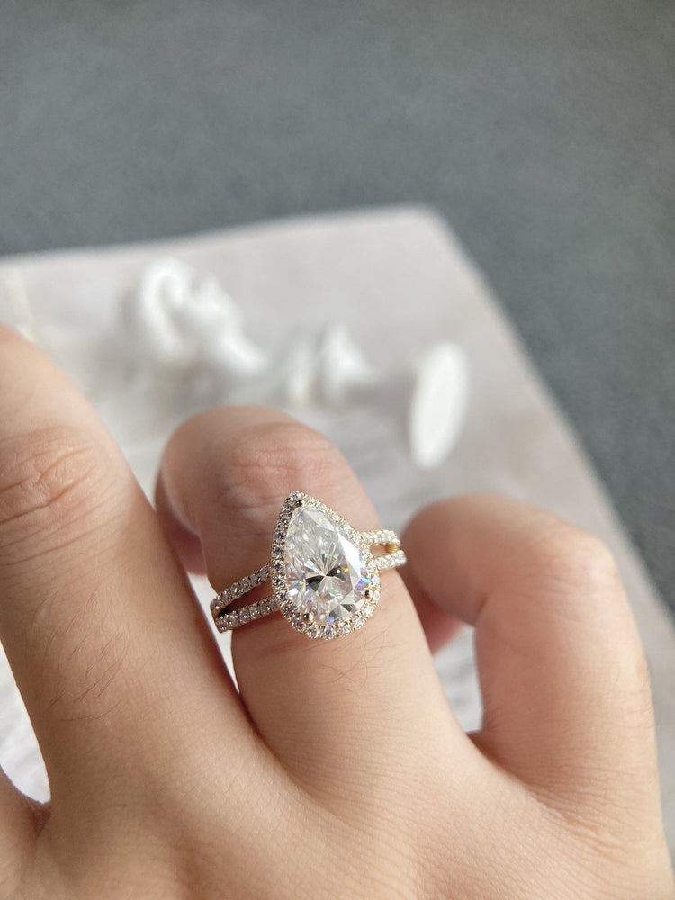 
                  
                    3.0 CT Pear Shaped Moissanite Engagement Ring With Halo Pave Style
                  
                