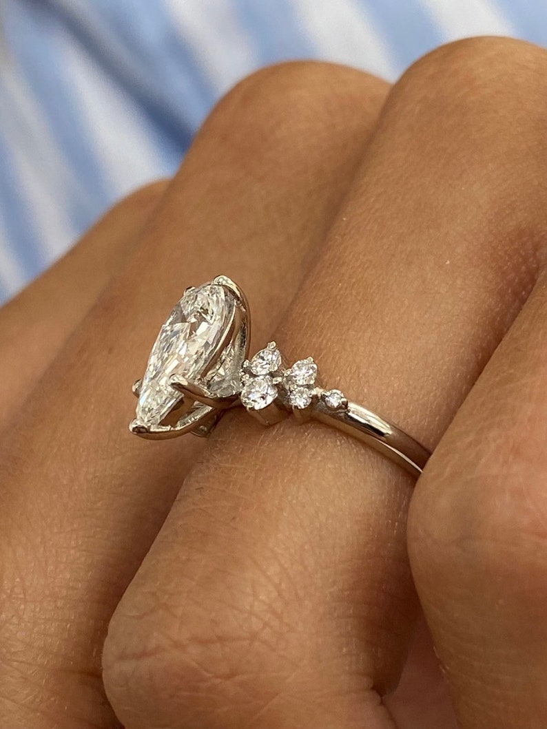 Stunning 1.50 CT Pear Moissanite Engagement Ring with Cluster Design 3