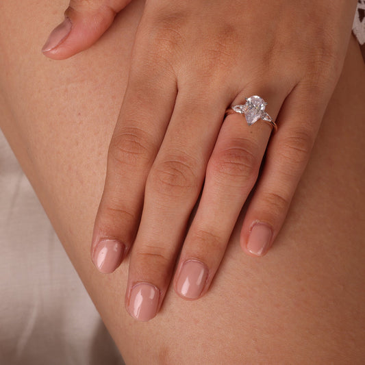 Stunning 2.0 CT Pear Moissanite Engagement Ring with Three Stone Design 2