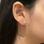0.70 TCW Round Cut Moissanite Hoops Earrings in Gold 7