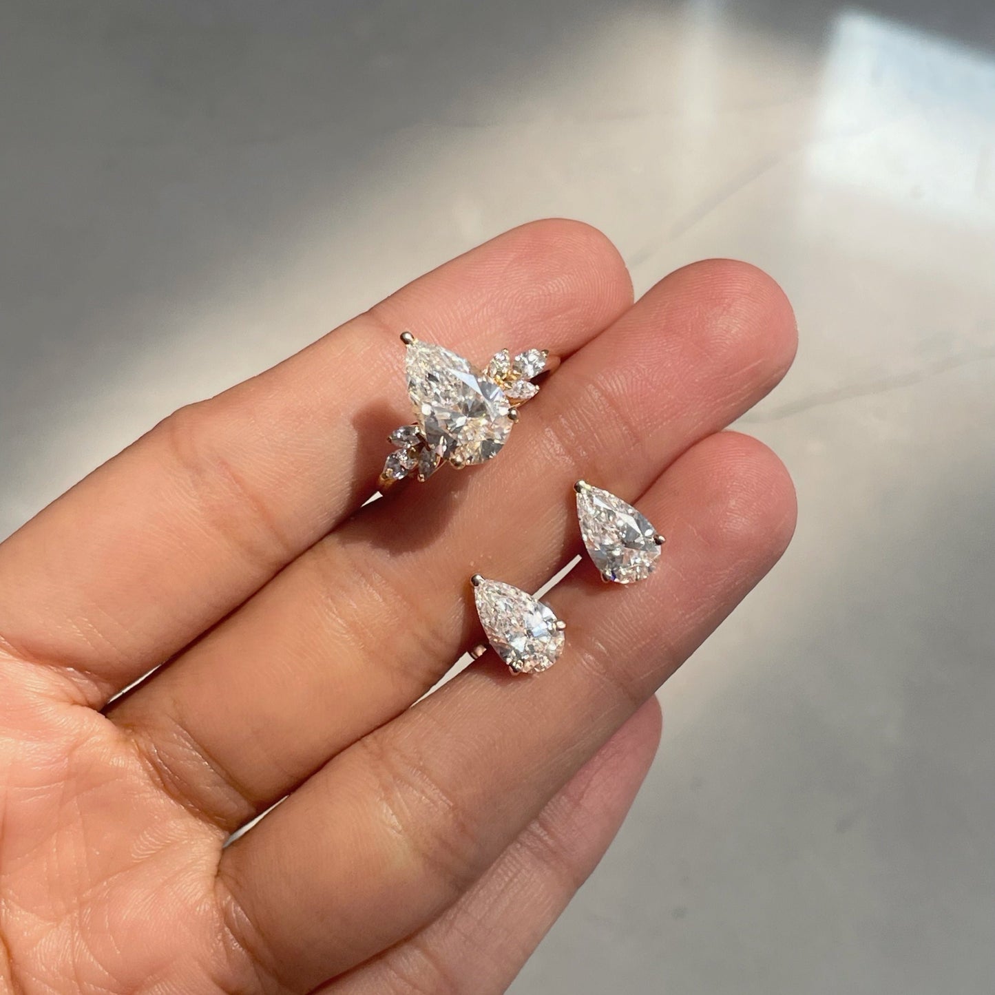 0.75 TCW Pear Cut Moissanite Stud Earrings in Gold 6