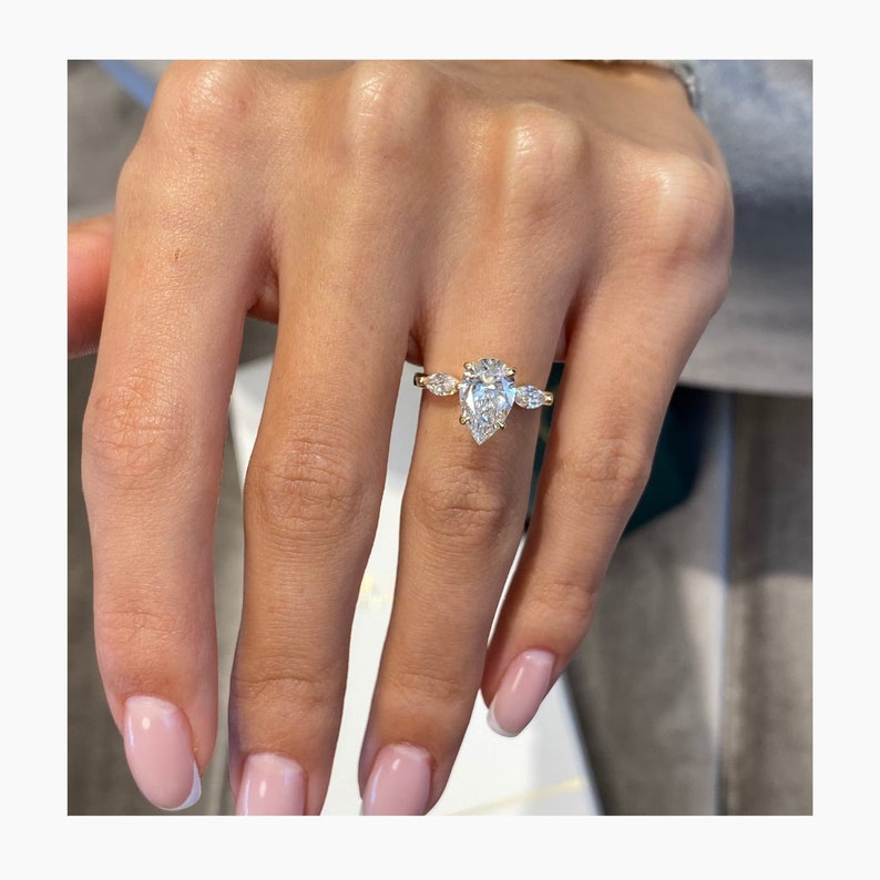 Stunning 1.75 CT Pear Moissanite Engagement Ring with Three Stone Design 3