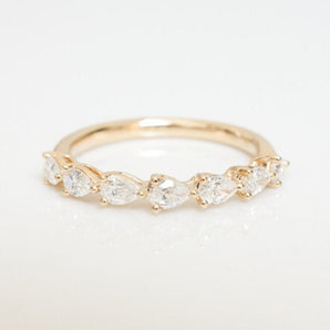 Stunning 0.4 TCW Pear Moissanite Stones in Half Eternity Wedding Band