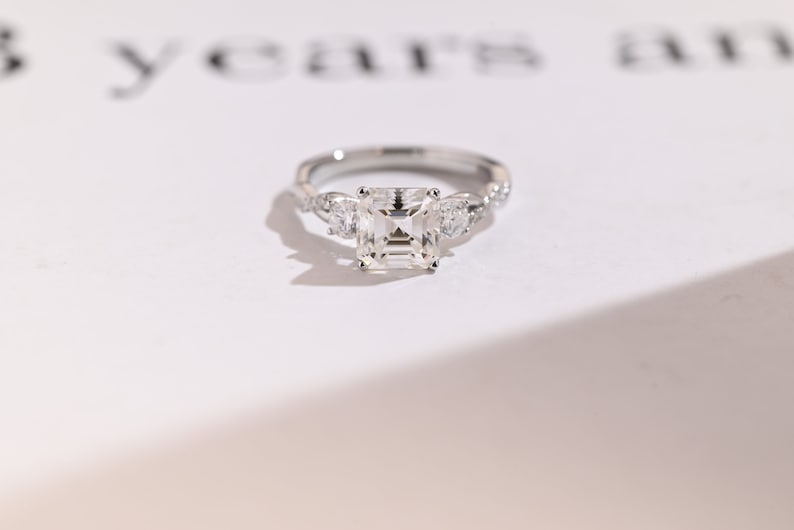 Stunning 1.0 - 2.0 CT Asscher Moissanite Engagement Ring With Twisted Pave Design 1