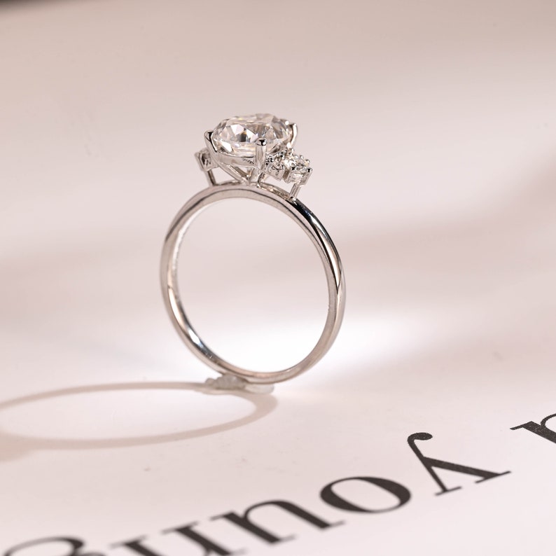 Stunning 1.0 - 2.0 CT Pear Moissanite Engagement Ring with Cluster Design 8