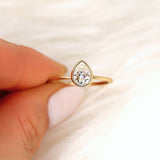 Stunning 0.75 CT Pear Moissanite Engagement Ring With Bezel Design 5