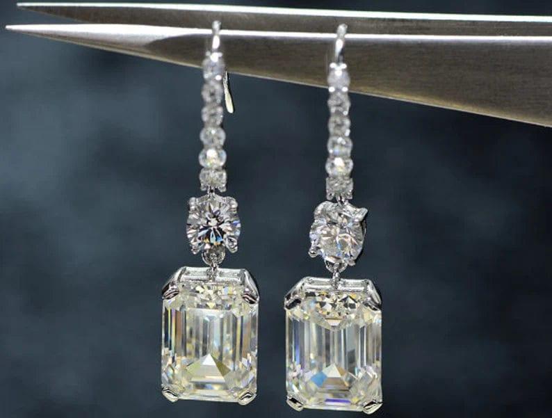 
                  
                    5 TCW Emerald Cut Multi Stone Drop Moissanite Earrings
                  
                