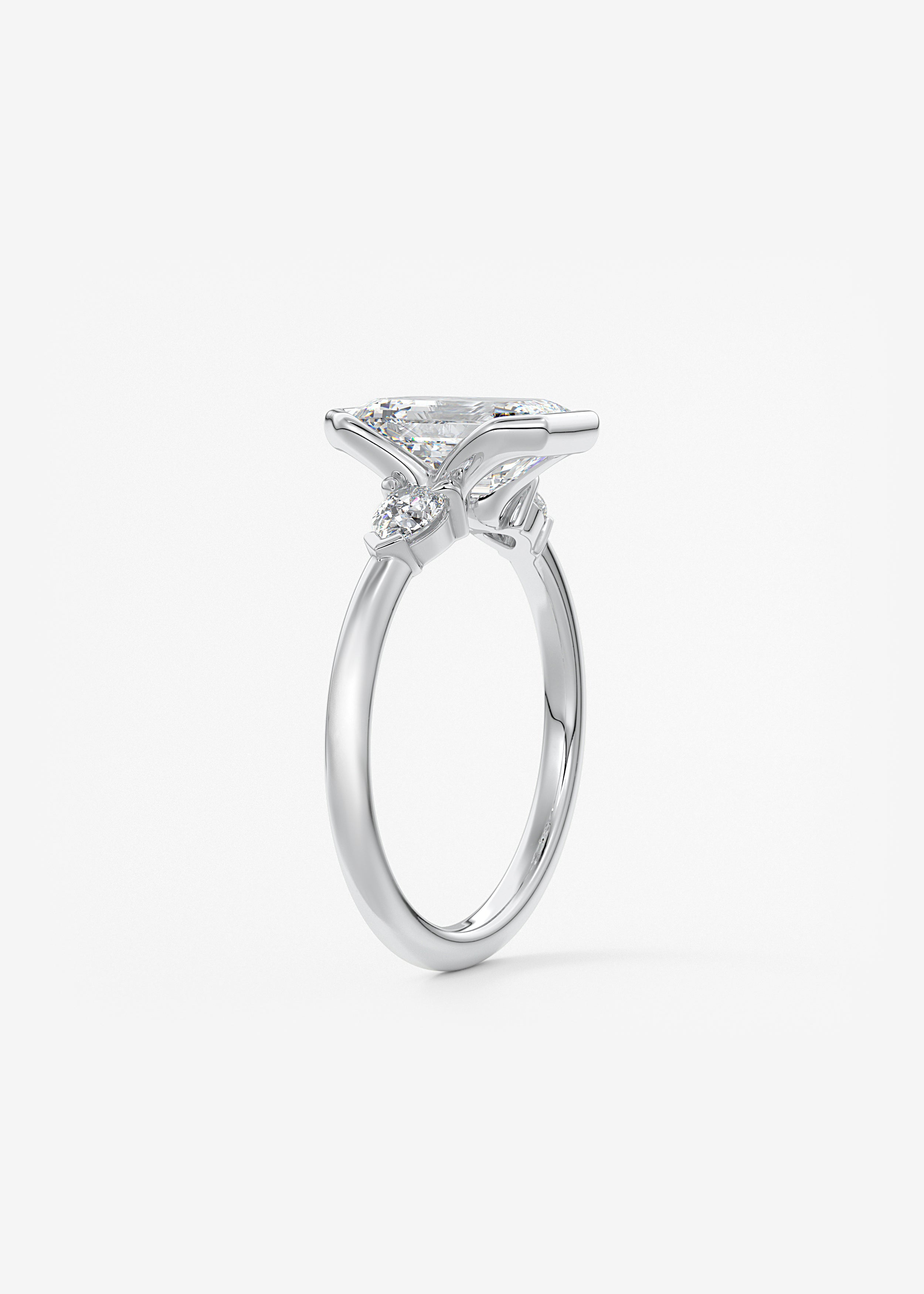 Emerald Three Stone Bezel Lab Grown Diamond Engagement Ring