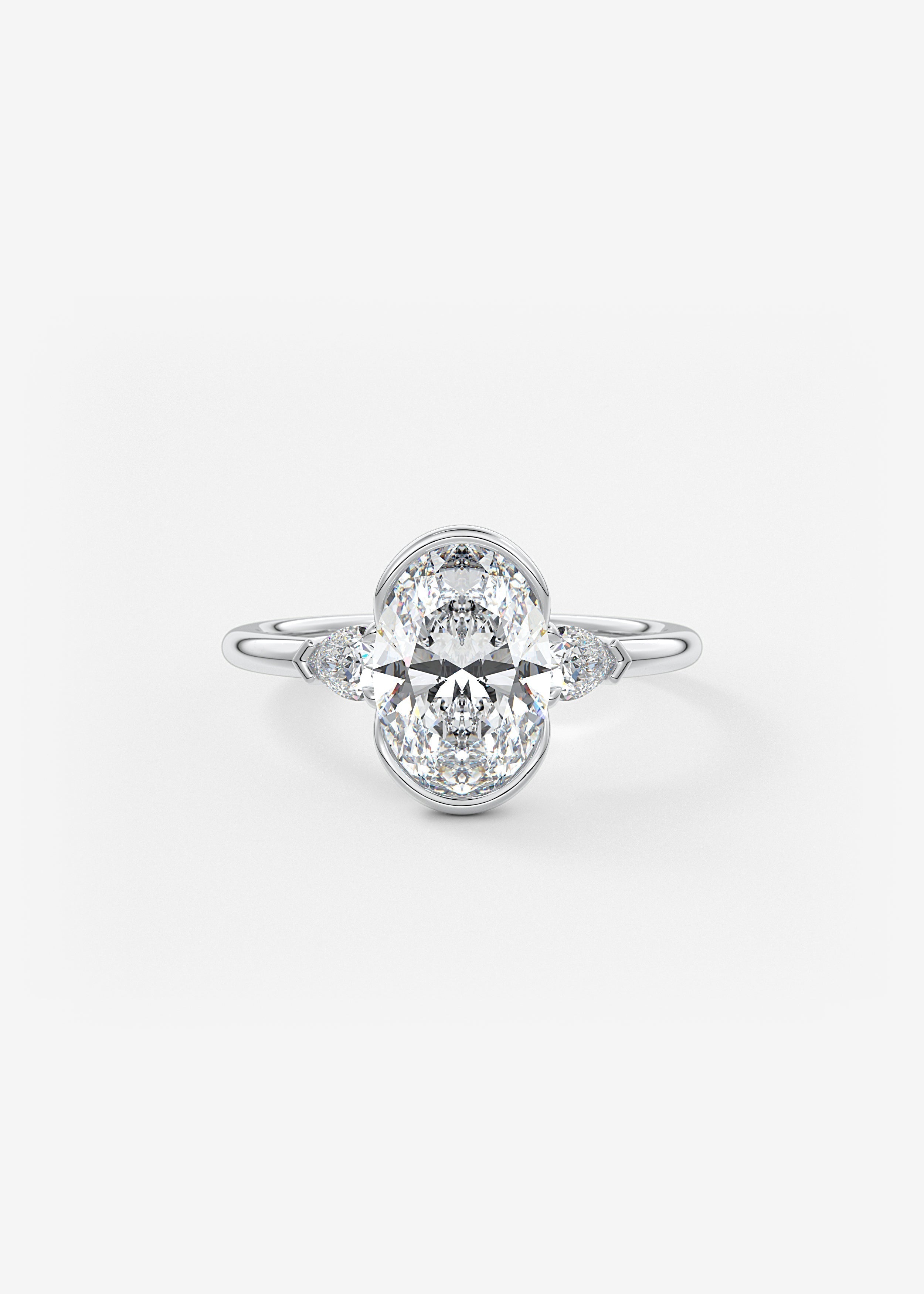 Oval Three Stone Bezel Lab Grown Diamond Engagement Ring