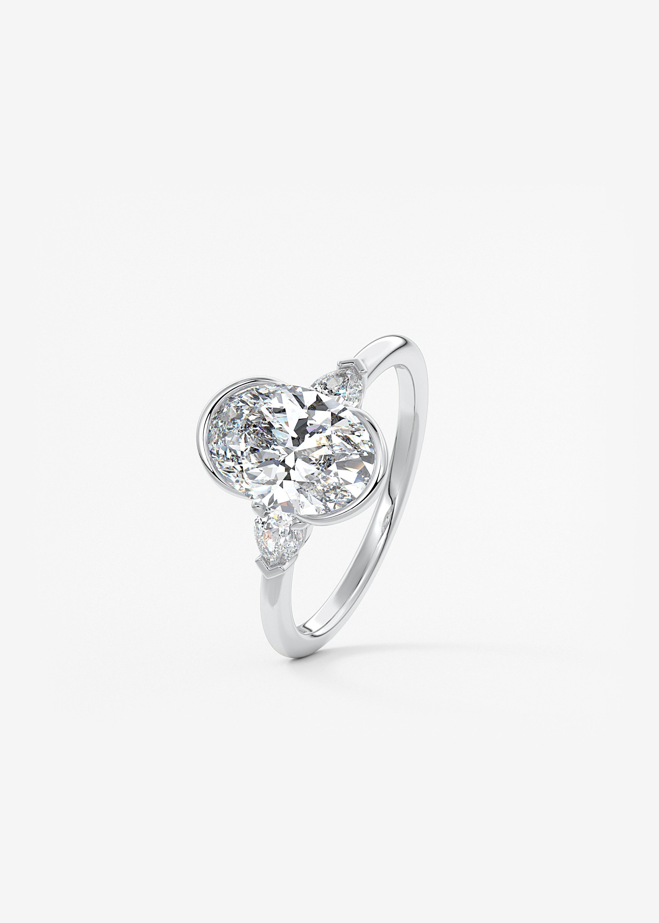 Oval Three Stone Bezel Lab Grown Diamond Engagement Ring