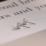 0.70 TCW Round Cut Moissanite Stud Earrings in Gold 5