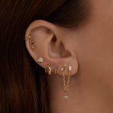 0.50 TCW Round Cut Moissanite Huggies Earrings in Gold 11