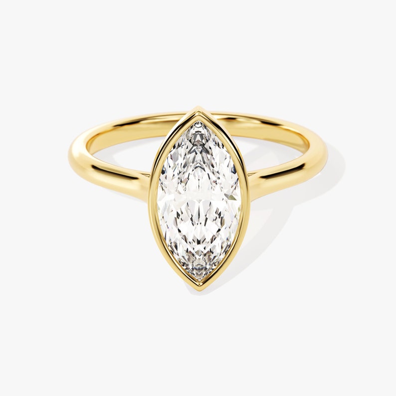 Stunning 1.0-2.0 CT Marquise Moissanite Engagement Ring with Bezel Design 1