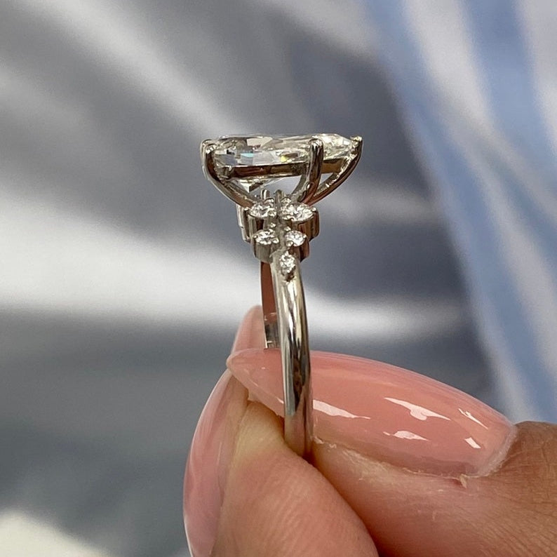 Stunning 1.50 CT Pear Moissanite Engagement Ring with Cluster Design 1