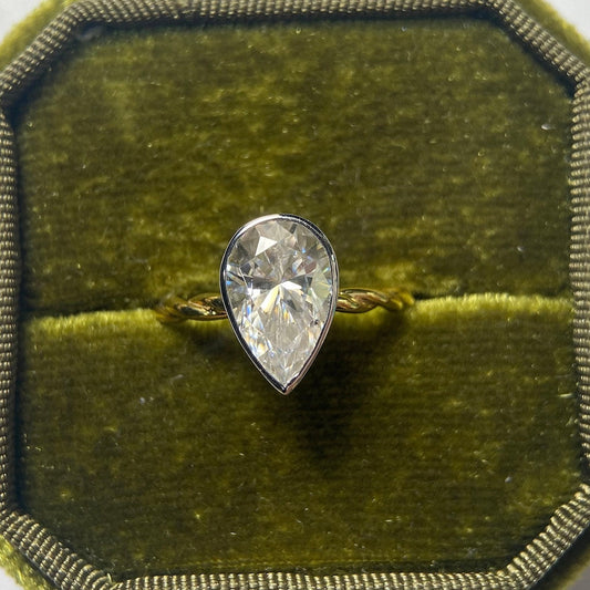 Stunning 3.0 CT Pear Moissanite Engagement Ring with Bezel Design 1