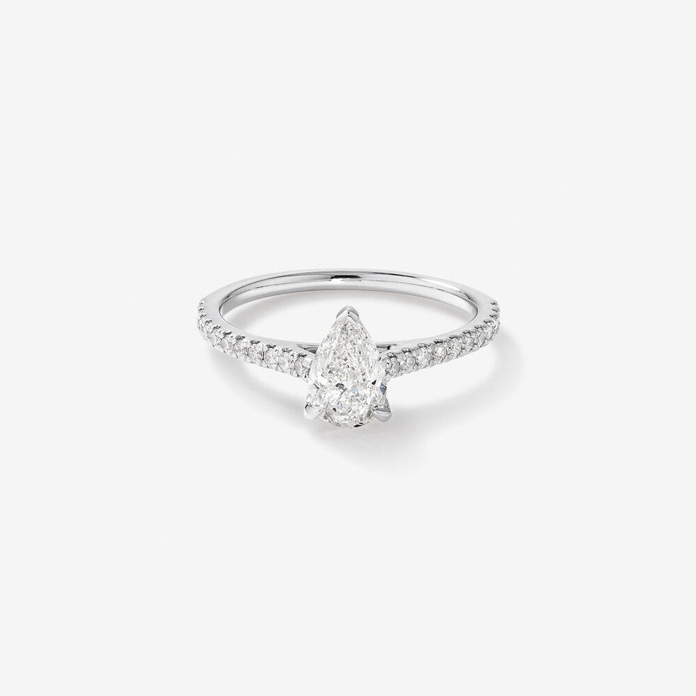 Stunning 1.20 CT Pear Moissanite Engagement Ring in Pave Designs 1