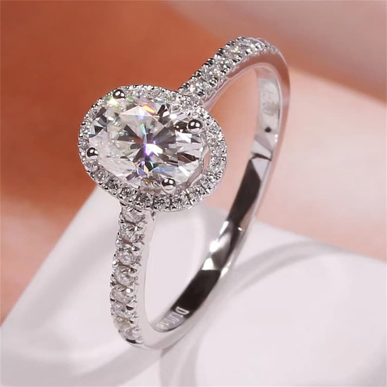 1.0 CT Oval Shaped Moissanite Engagement Ring With Halo Pave Accents